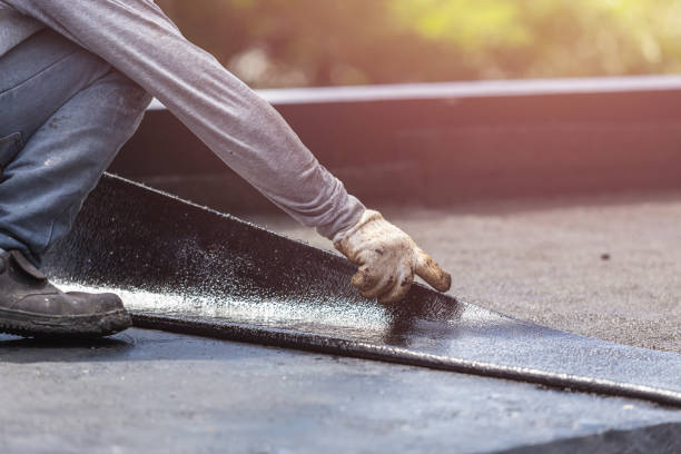 Professional Basement Waterproofing technician working in Port Washington, NY